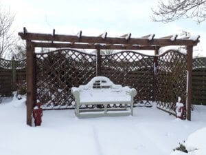 A bench in a snowdrift at Abbots Green in North Yorkshire